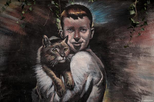 Cat and Boy mural on wall - Bergen