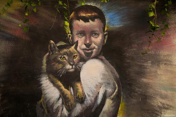 Cat and Boy mural on wall - Bergen