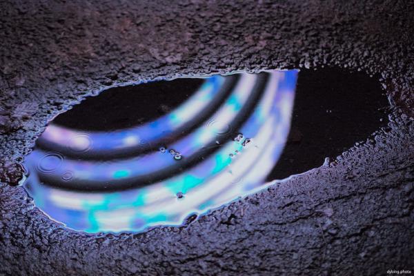 Night reflection in puddle