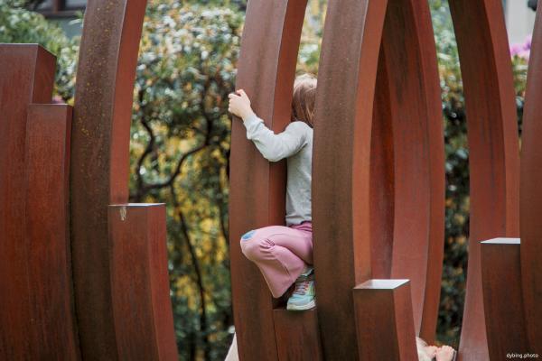 Kid on Sculpture