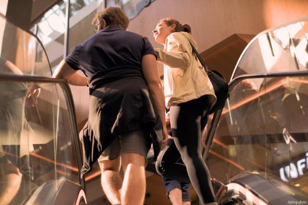 Couple on escalator - September