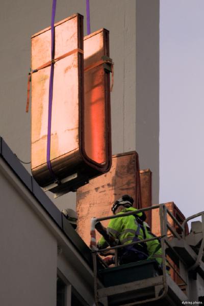 Signage going up at renovated old shopping center - November