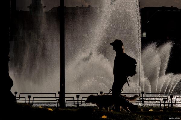Silhouette by fountain - October
